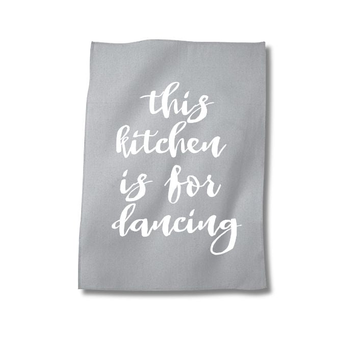 Graues Geschirr Tuch mit dem Spruch "This kitchen is for dancing" in Siebdruck