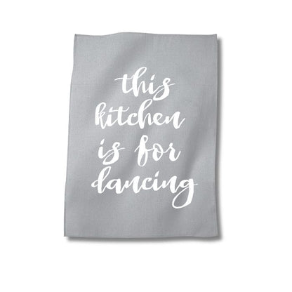 Graues Geschirr Tuch mit dem Spruch "This kitchen is for dancing" in Siebdruck